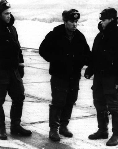 Major Osipovich (center)